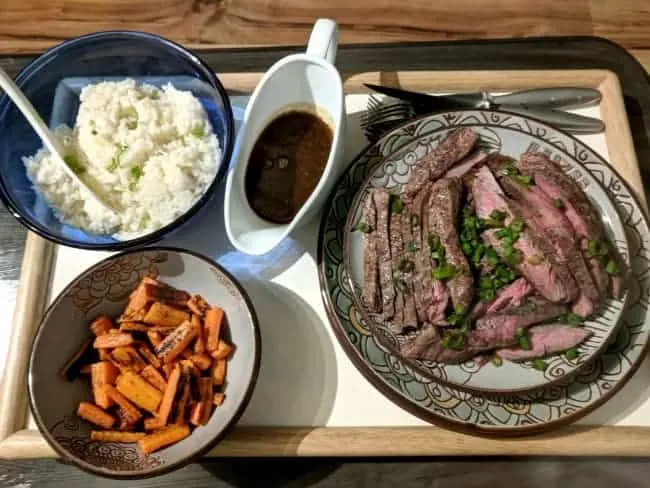 Steak and sides with a Blue Apron meal.