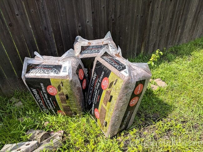 Three bags of Quick Straw Pine Straw mulch. This was all we needed for the entire strip of garden.