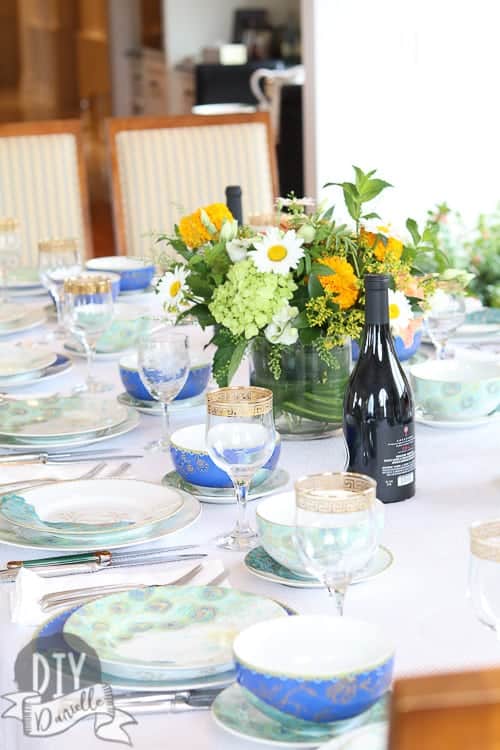 Peacock tablescape setup for a big family dinner.