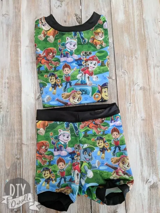 This bathing suit set was made with a rashguard and swimmers pattern. Get my tips and adjustments here. Paw Patrol Swim Shorts and Rashguard set.