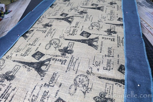 Pinned burlap fabric to make a serger mat.