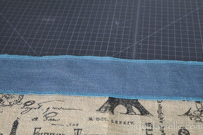 Blue burlap sewn over brown decorative burlap for edging.