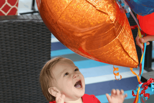 Favor Ideas for Kids Parties: Little Boy Playing with Balloons