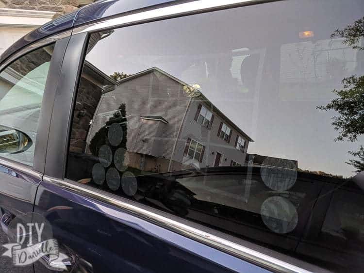 View of the window clings on the vehicle window from the outside of the car.