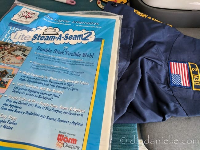 Using double stick fusible web to apply a Boy Scout's patch. This is great even if you plan to sew it on.