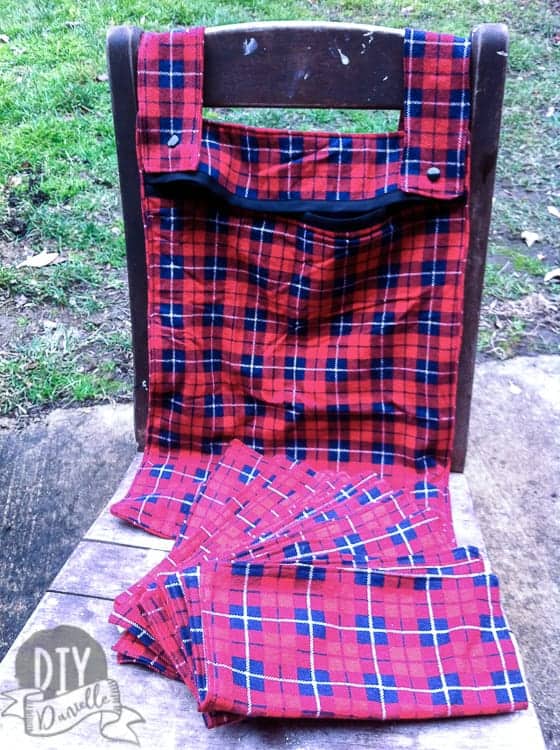 Red and black plaid kitchen wet bag with matching unpaper towels.
