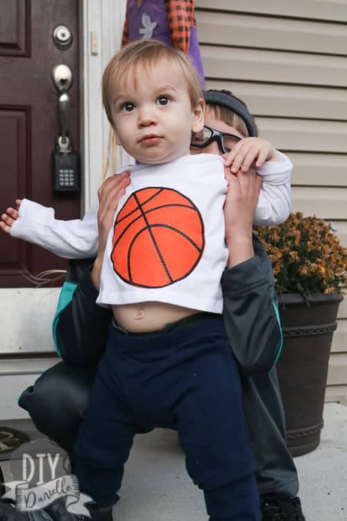 Baby as a basketball for Halloween. Easy shirt idea.