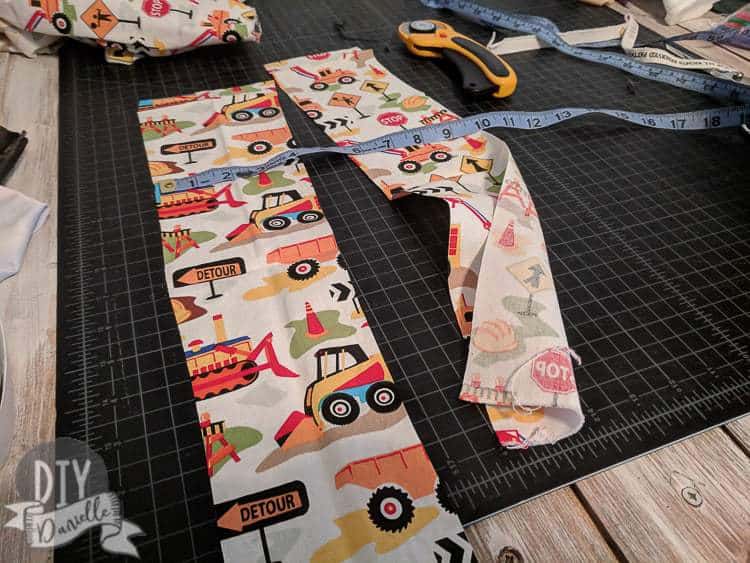 Cutting fabric for the straps. Construction vehicle fabric.