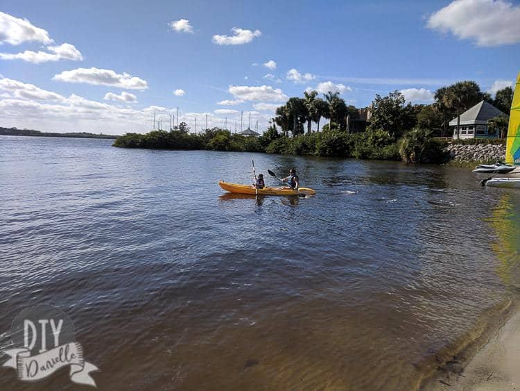 Kayaking with my son at Sandpiper Bay Resort in the river.