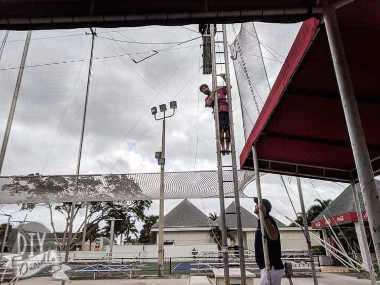 My husband climbing up to do trapeze.