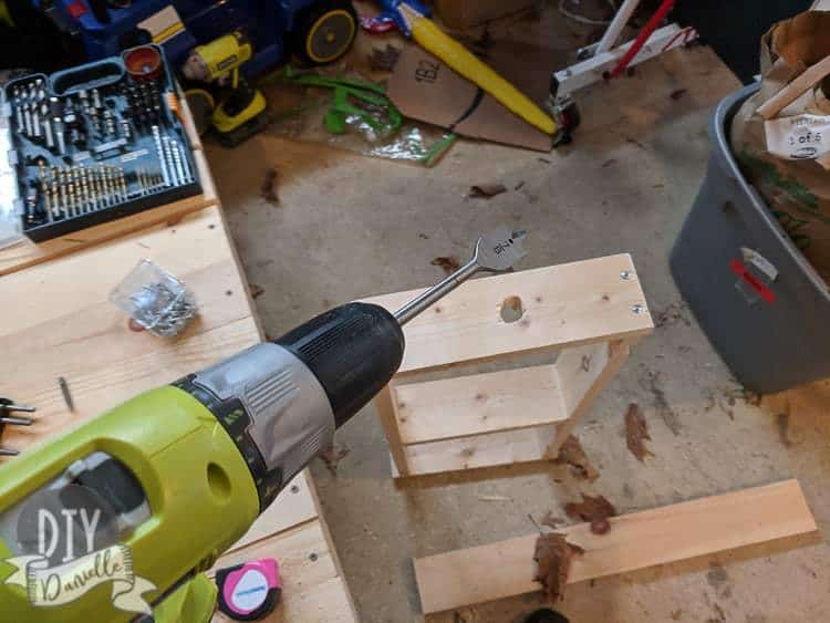 Using a spade bit to create a perfect size hole for an electric toothbrush. The hole in the photo was attempted with a jig saw and is a bit wonky.