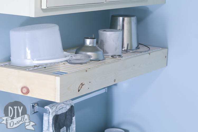 Drying rack using raw 1x4s and old wire shelving. Goat milking supplies on top. 