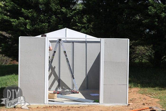 Gables being installed in the shed.