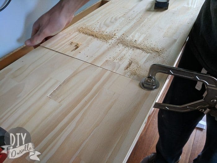 Using pocket screws to attach the cabinet pieces.