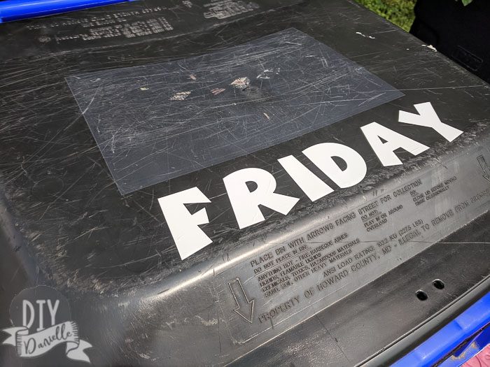 Labeled recycling bin that says "Friday" for the delivery day.