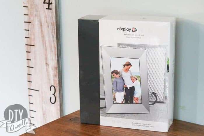 Nix Digital Photo Frame on Family Room Cabinet, still in the box