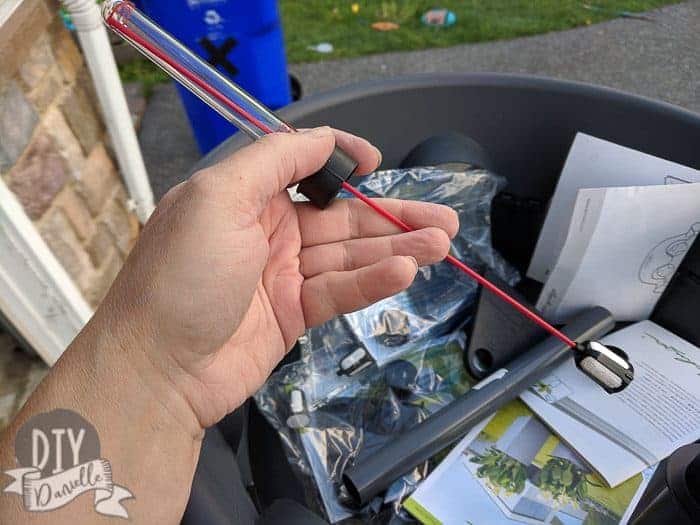 Putting together the self watering kit.