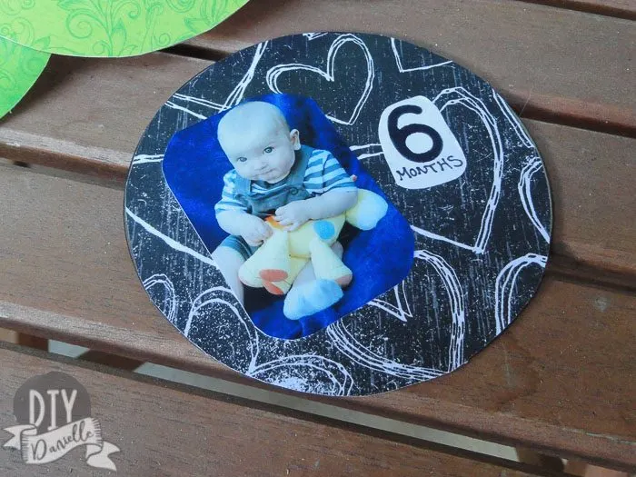 6 months old baby photo on scrapbook paper and a CD