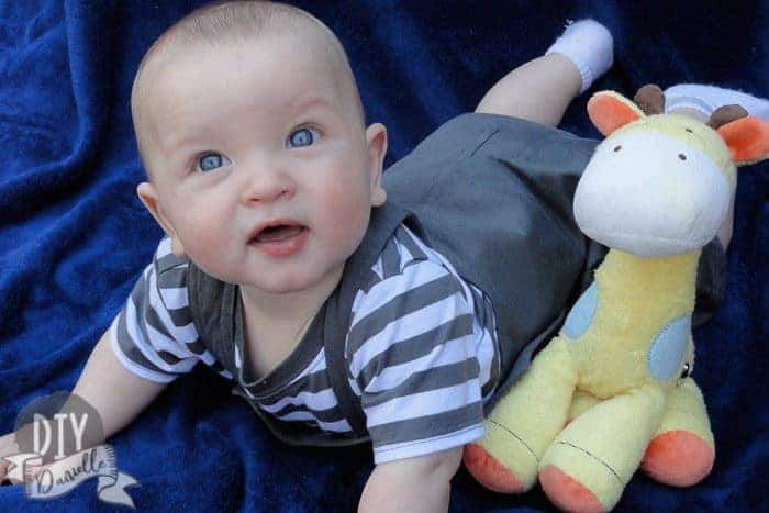 5 month old baby photos on a piece of blue fabric.