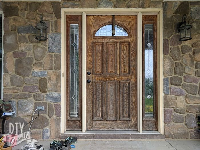 Faded front door entry. "Before" staining.