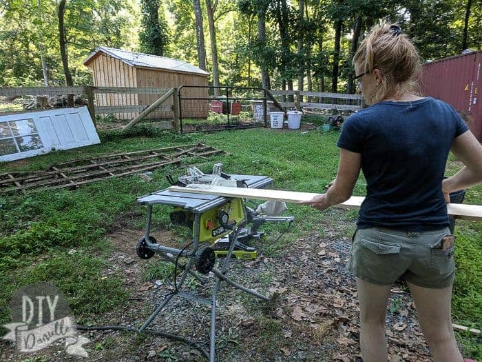 Scottie stripping the wood with her Ryobi table saw.