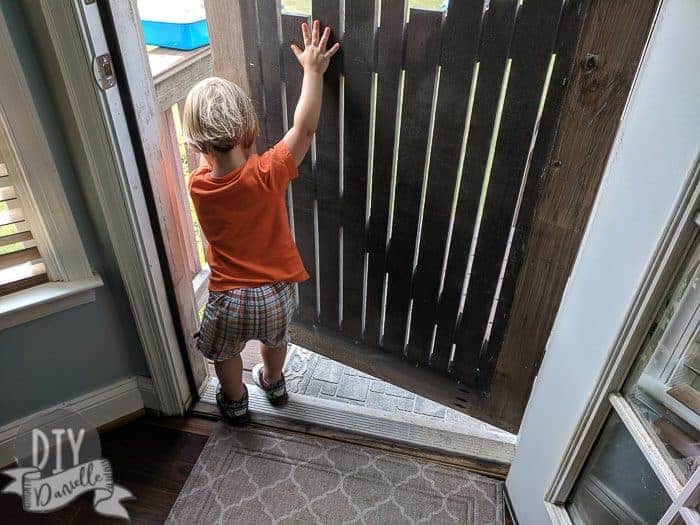 Inside of the screen door. Screening is stapled on.