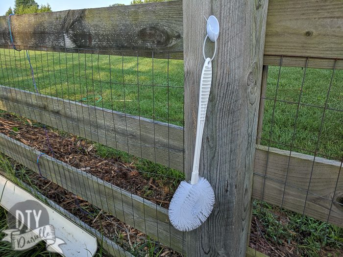 Clean toilet brush to scrub the sides of the trough as needed.