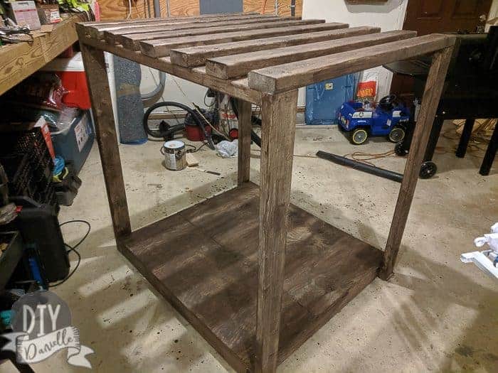 Wood structure of the cabana completed and stained with Behr Premium Waterproof Semi Transparent Stain in Cordovan Brown