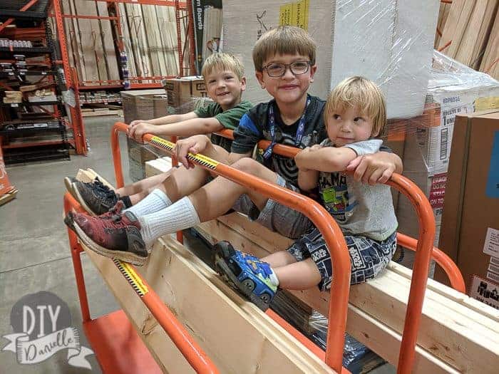 Picking up 2x4s for the dog cabana at the store with the 3 boys. 