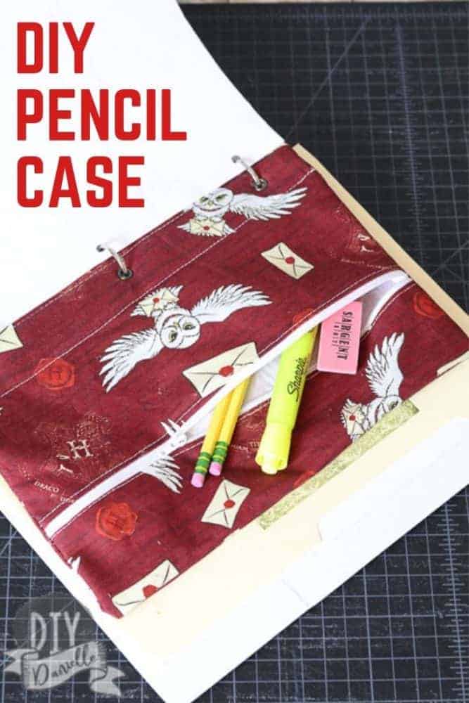 DIY Pencil Case with a zipper and grommets for a 3-ring binder.