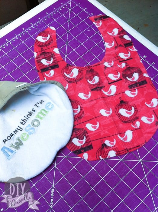 Flannel fabric cut to about same size and shape as a bib I had at home.