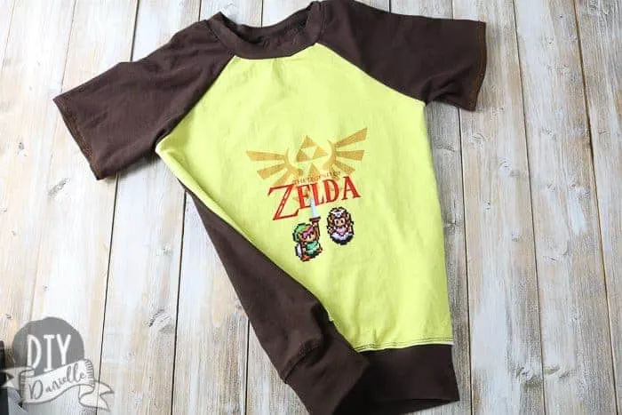 Boy's Raglan Pattern sewn up: Zelda panel for the front of the shirt, the neckband, sleeves, and shirt back are brown.