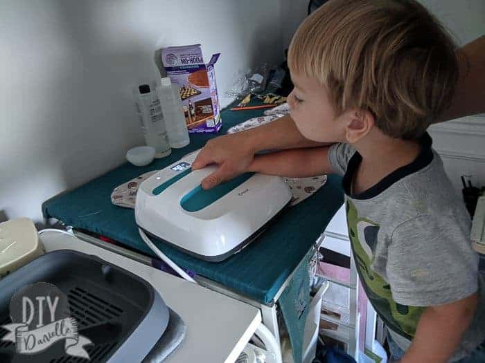 Pressing the burp cloths before topstitching.