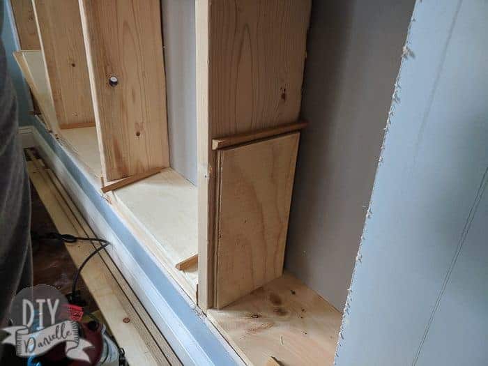 Adding a piece of trim to use to hold up the shelf. 