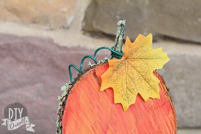 Close up of the wood slice turned into a Fall pumpkin!