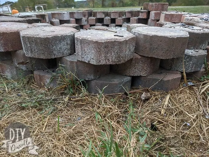 Three levels of pavers made this easy fire pit. They're alternating placement.