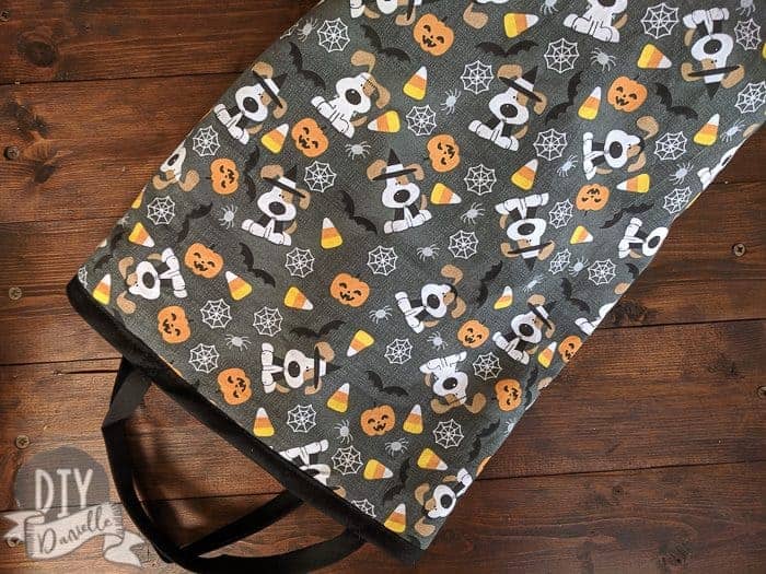 Halloween bag laying on it's side: Puppies, Candy Corn, Spiders & Spider Web Fabric.