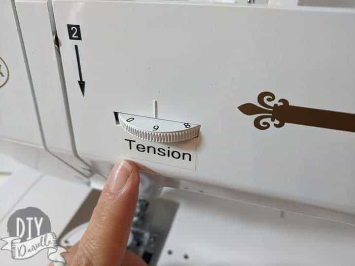 Tension dial for the upper thread of a sewing machine (Husqvarna machine): Labeled with label maker