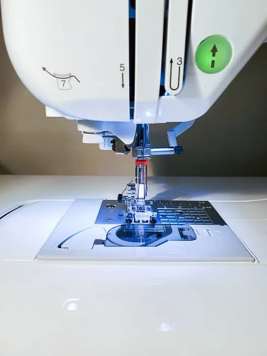 Twin needle placed in a sewing machine to sew knits.