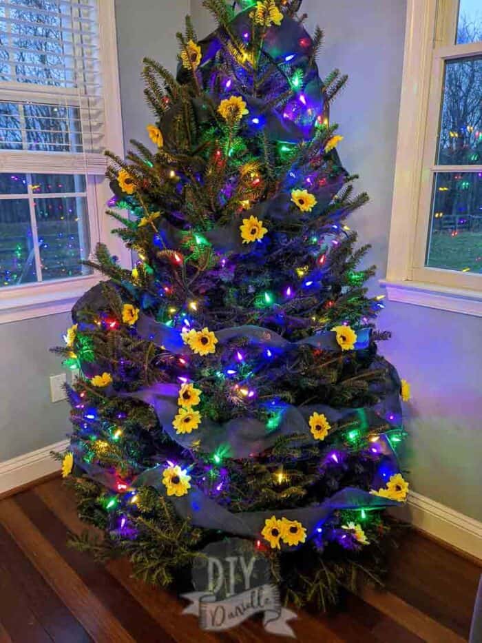 Sunflower tree with multi colored lights (red purple yellow blue)