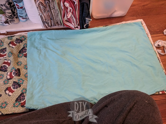 Using a current pillowcase as a template for the floor pillow. 