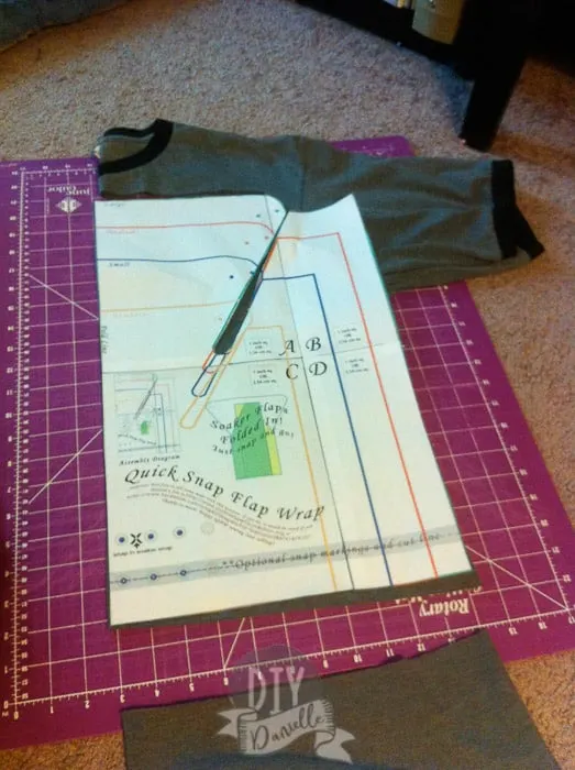 Cutting out the pattern for a quick snap flap wrap on top of a men's shirt.