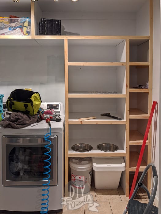 Adding 1x2s for trim to the front of the shelves. 