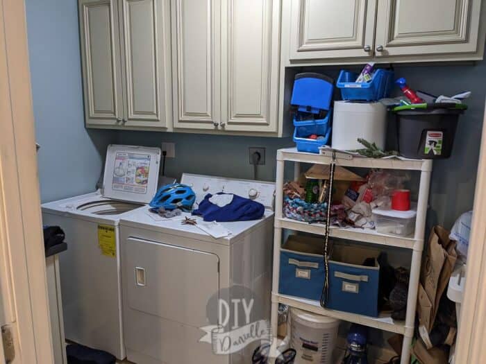 Mudroom pictures before. Messy room with no place to store anything neatly.