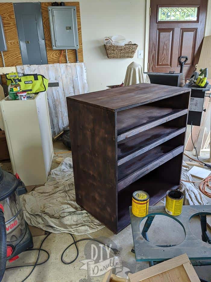 Staining the cart before adding the wheels.