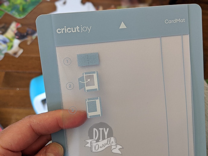 The special card mat for the Cricut Joy has a top layer to separate the layers of your card while cutting.
