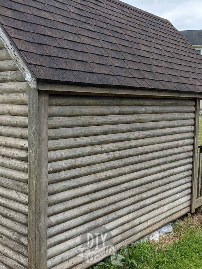 "Washed" wood of the log cabin playhouse. 