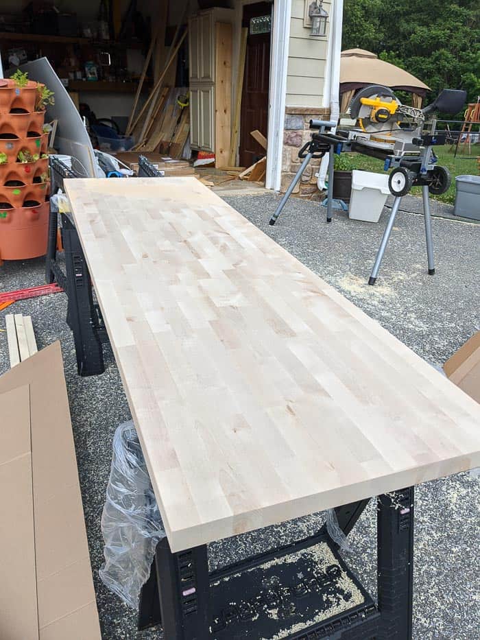 Butcherblock being cut on the driveway.