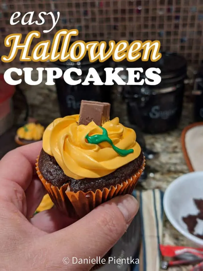 Easy Halloween cupcakes: Chocolate eggless cupcakes with orange frosting and a candy stem. 