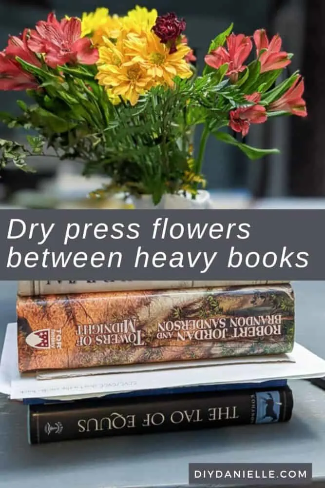 Using heavy books to press the flowers. I'll leave these for a few weeks.